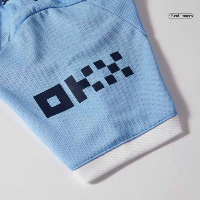KIT ENFANT MANCHESTER CITY 25/26 DOMICILE