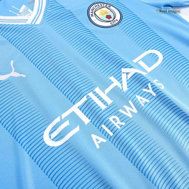 KIT ENFANT MANCHESTER CITY 23/24 DOMICILE